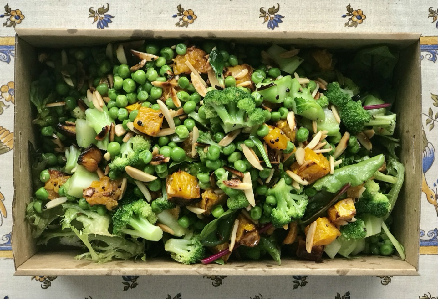 Roast pumpkin and broccoli salad in a catering box